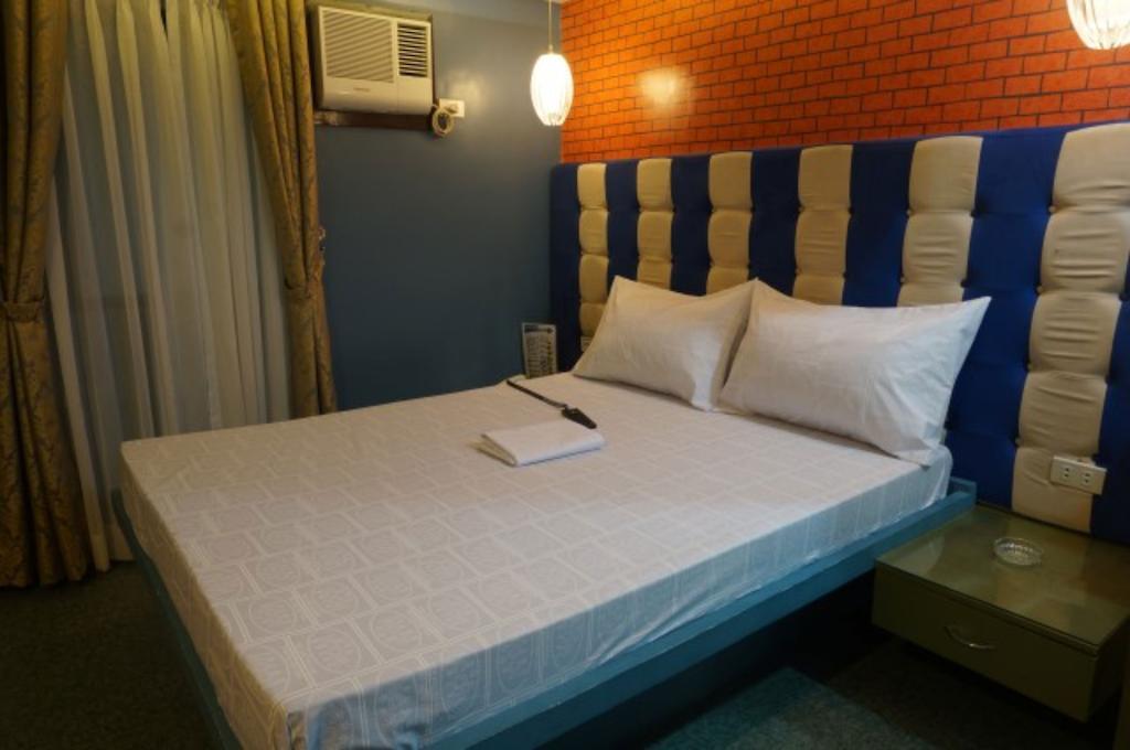 Icon Hotel Manila Værelse billede